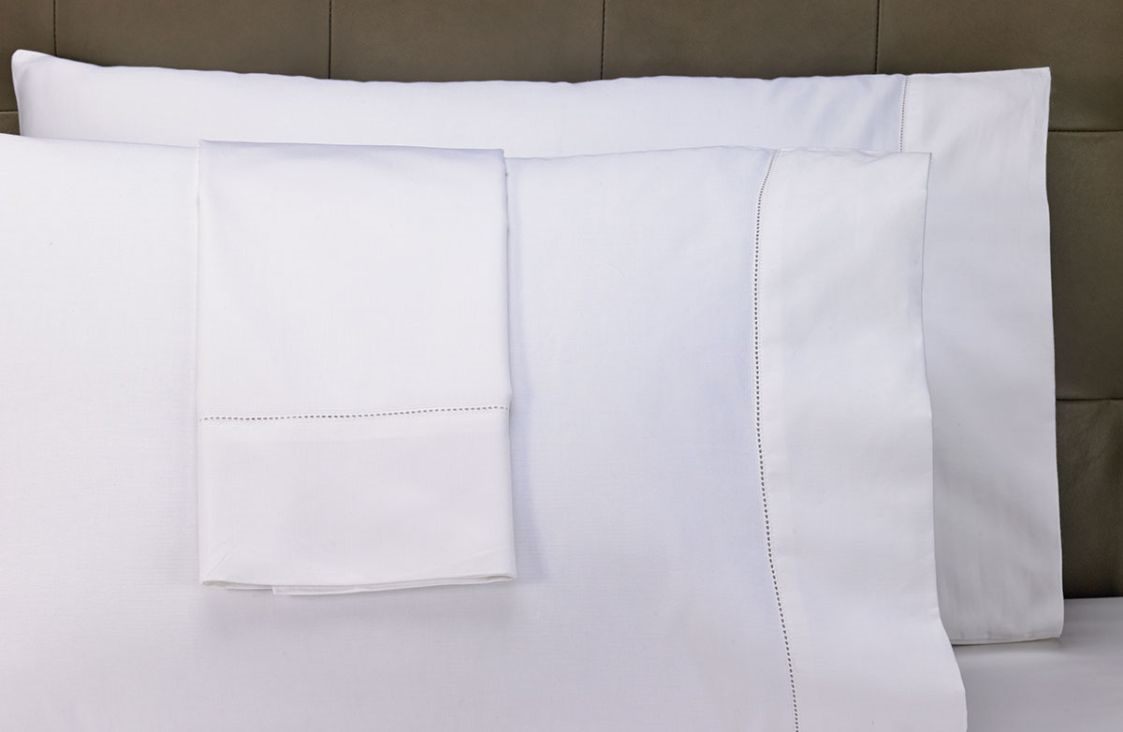 White hotel pillow with cover